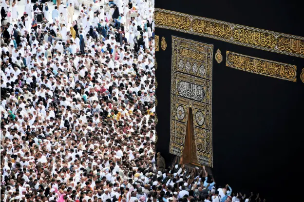 Suitcase and essential items for preparing Umrah and performing the pilgrimage with peace of mind
