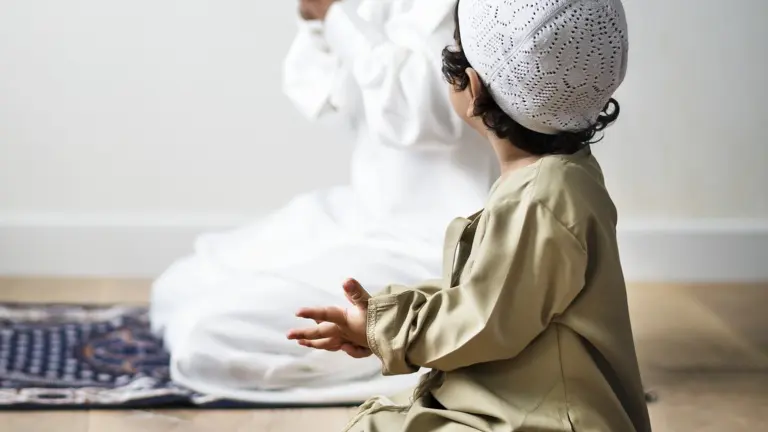 Child learning Muslim supplications