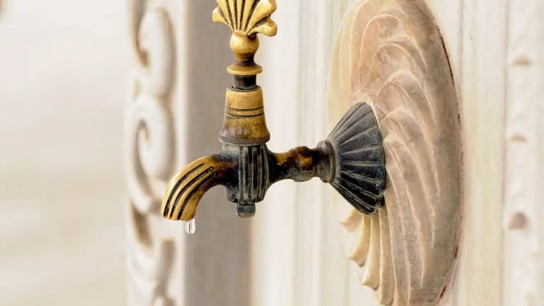 Decorative faucet illustrating wudu ritual ablution in Islam