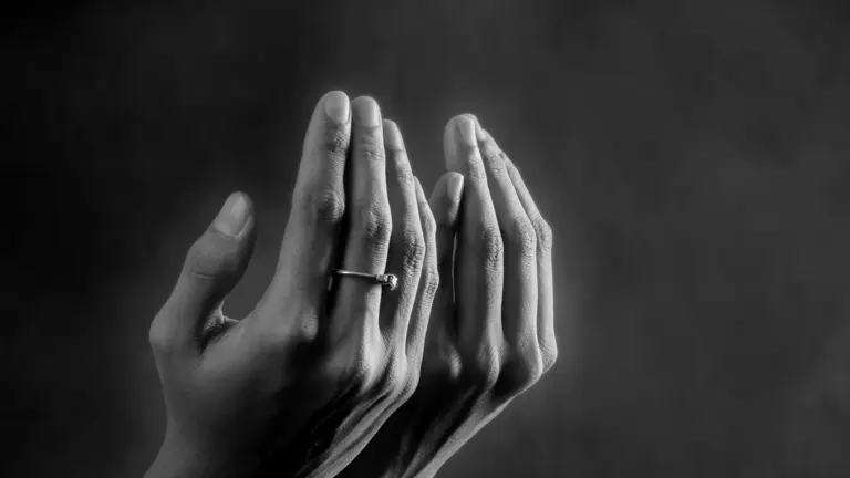 Hands raised in supplication for Istikhara prayer