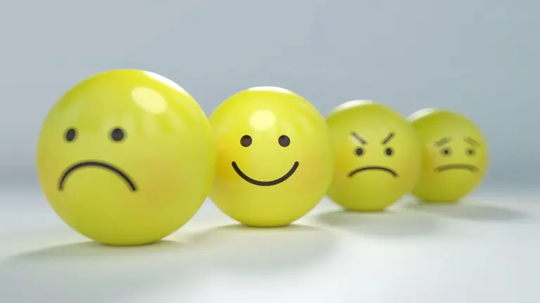 Faces showing sadness and inner peace