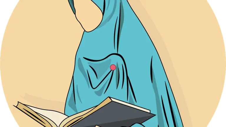 Muslim woman reading the Quran during Ramadan