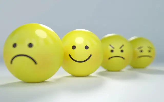 Faces showing sadness and inner peace