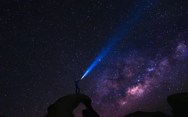 Person looking at the sky while reflecting on dua