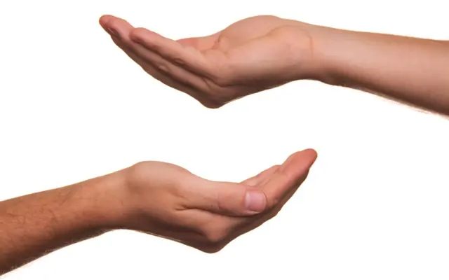 Open hands making dua against poverty