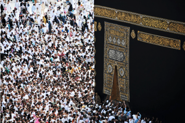 Suitcase and essential items for preparing Umrah and performing the pilgrimage with peace of mind