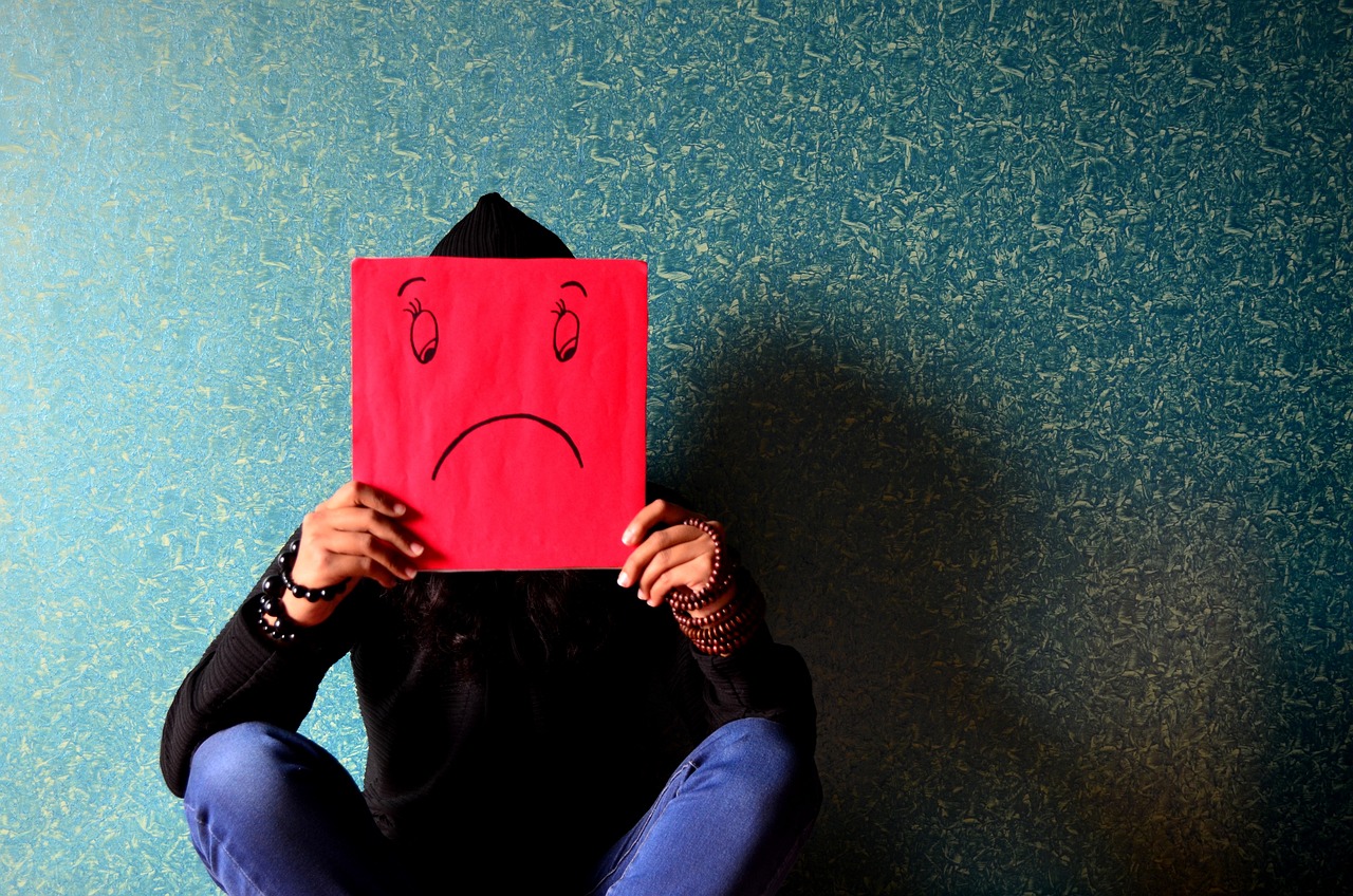 Personne triste illustrant le stress et l’anxiété